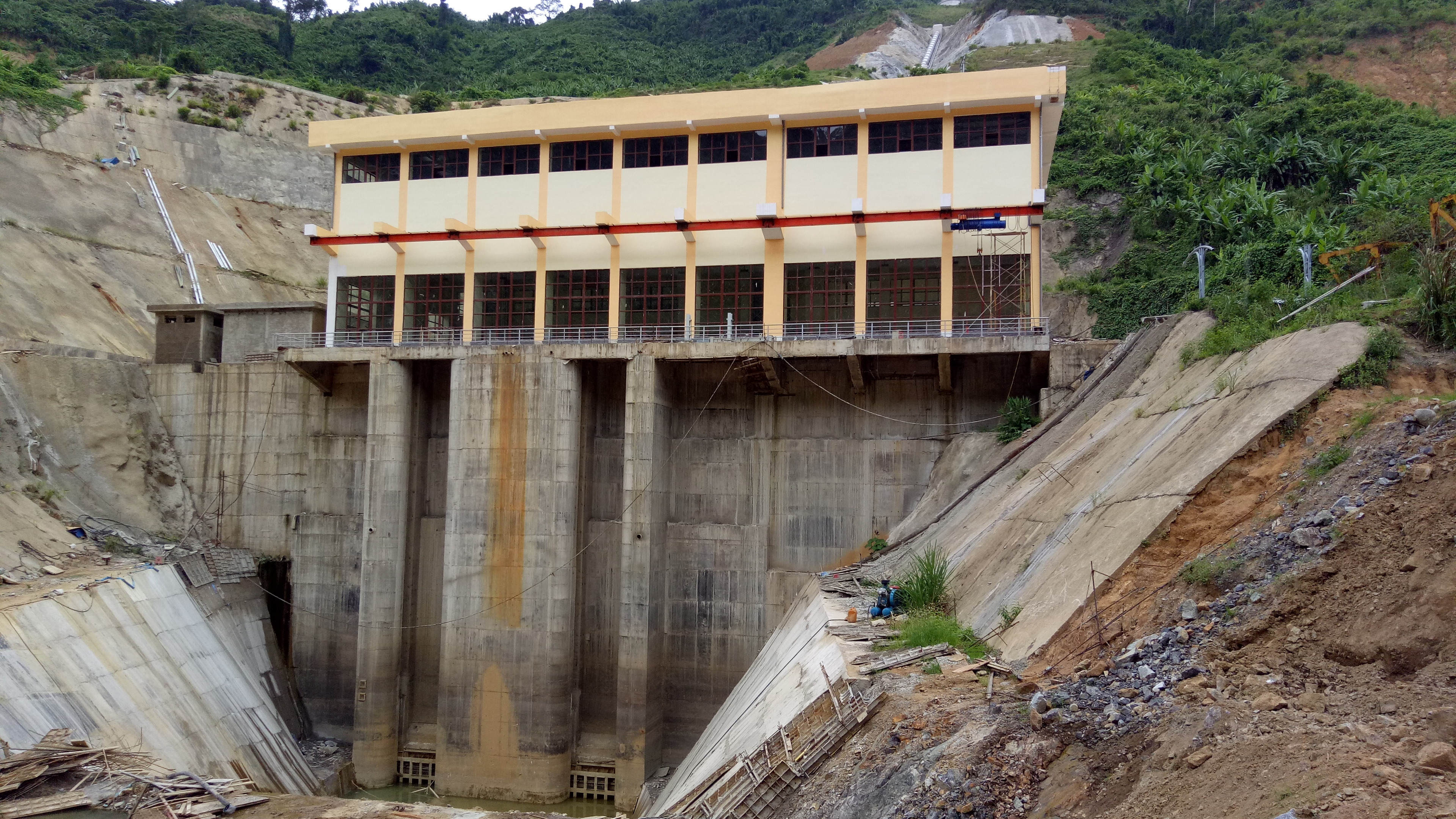 Dam powerhouse building at Song Bung hydropower plant in Vietnam