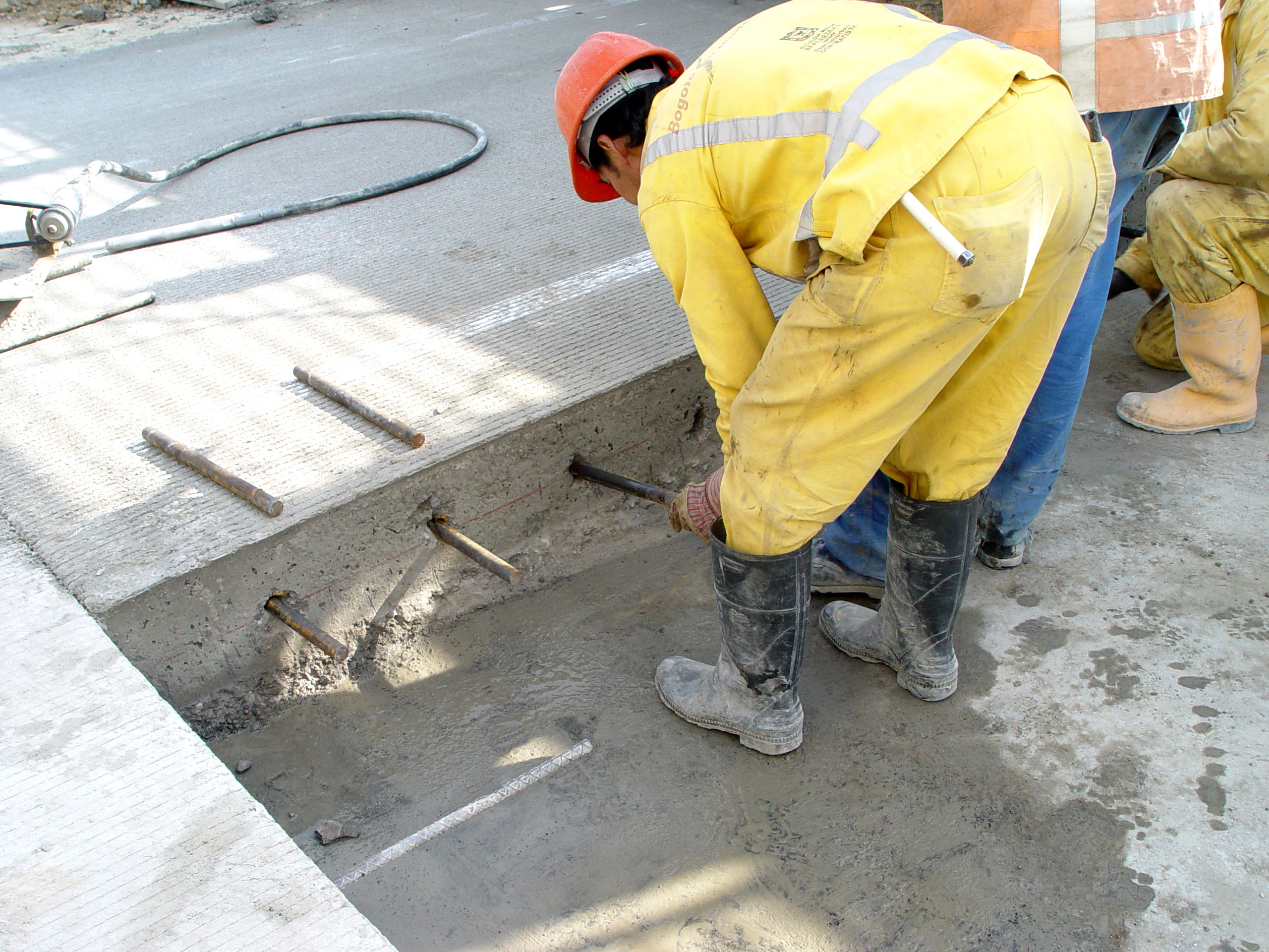 Man Applying Sika AnchorFix at a construction